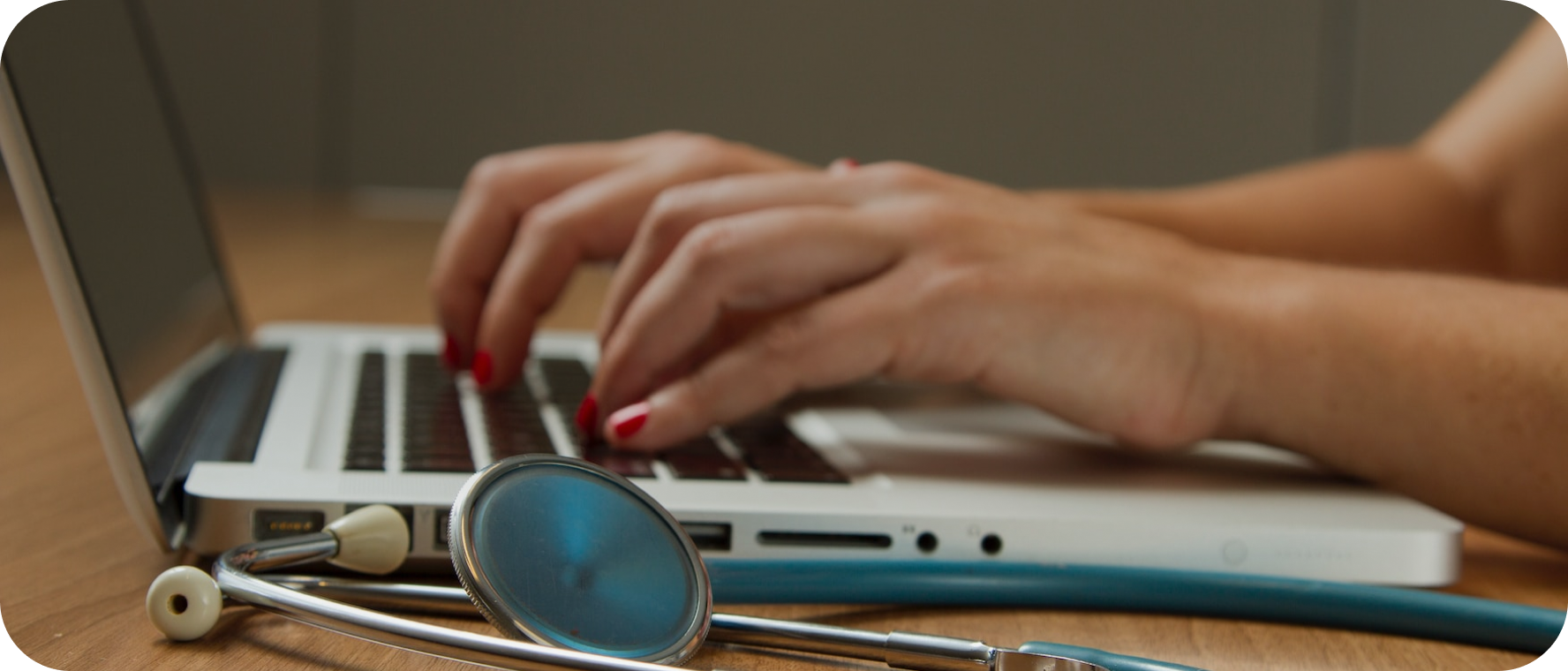 a person typing on a laptop