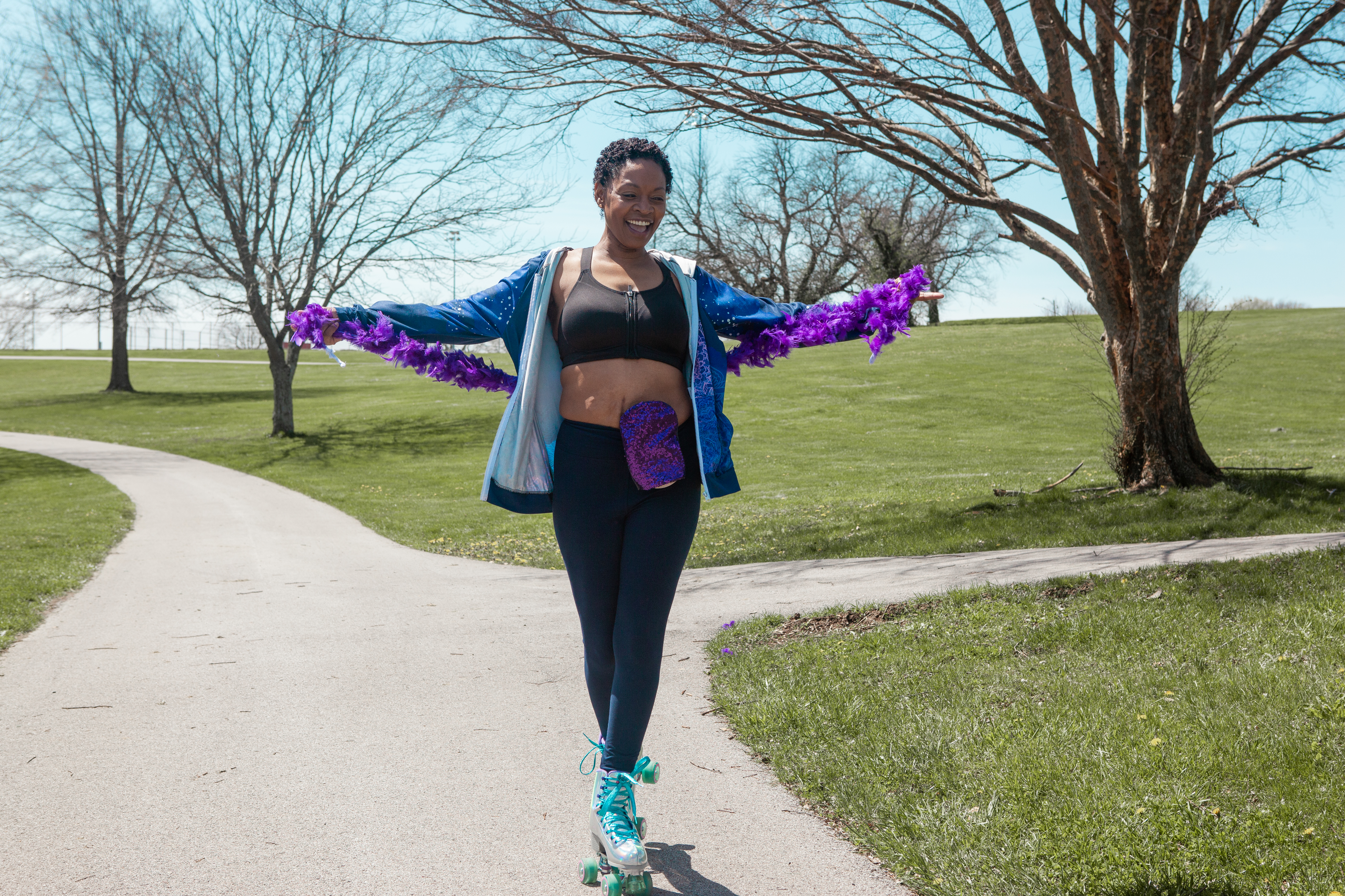 a woman rollerskating on a path