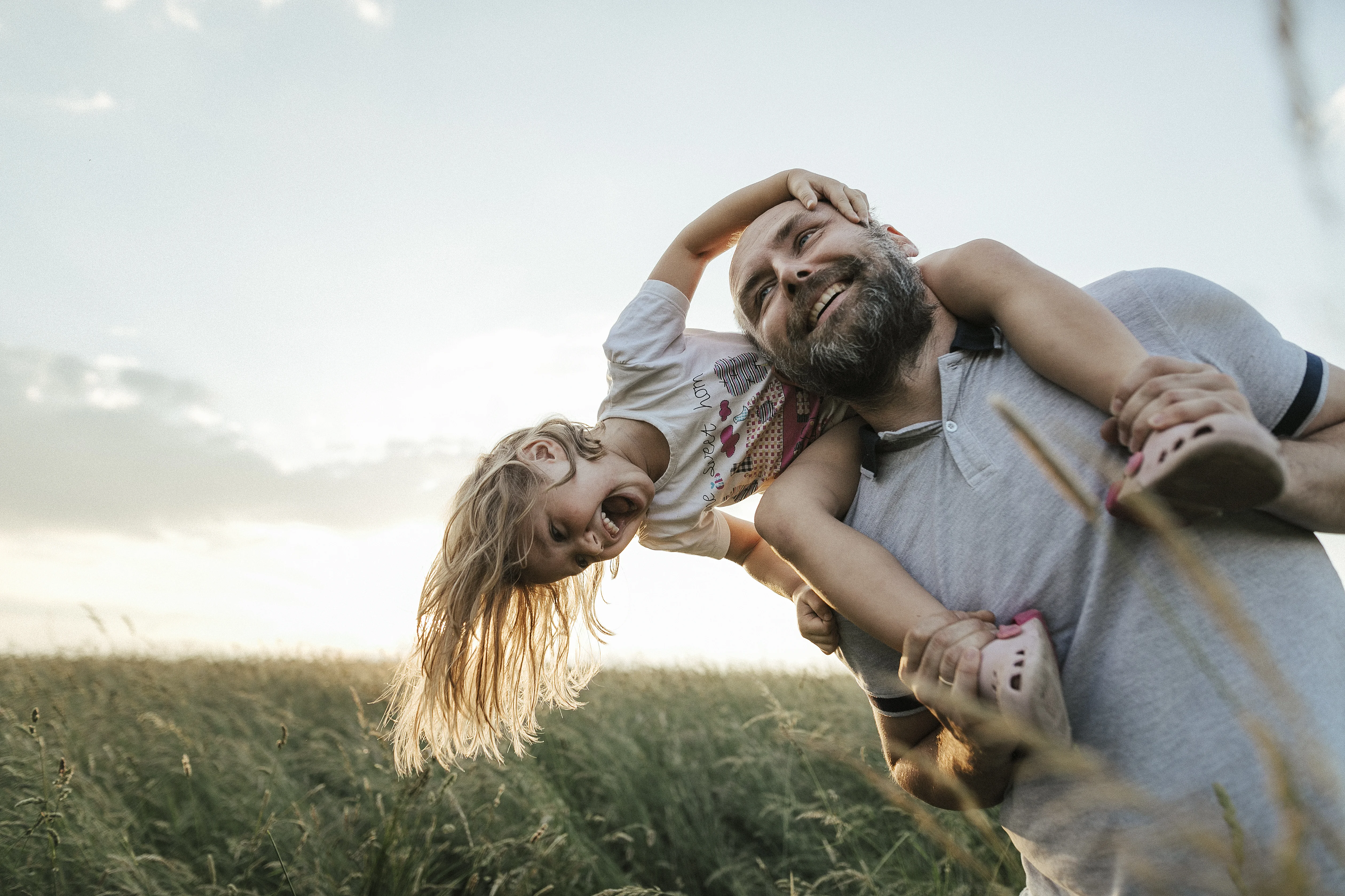 Convatec ostomy care products, featuring image of man with daughter