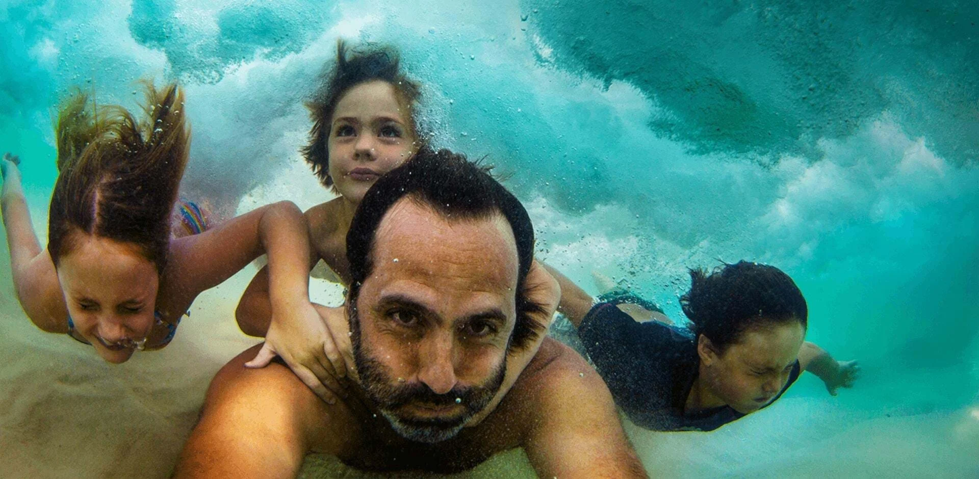 a group of people in a pool